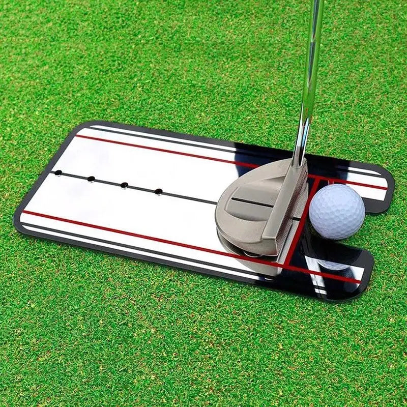 Golf putter and ball on a green grass background